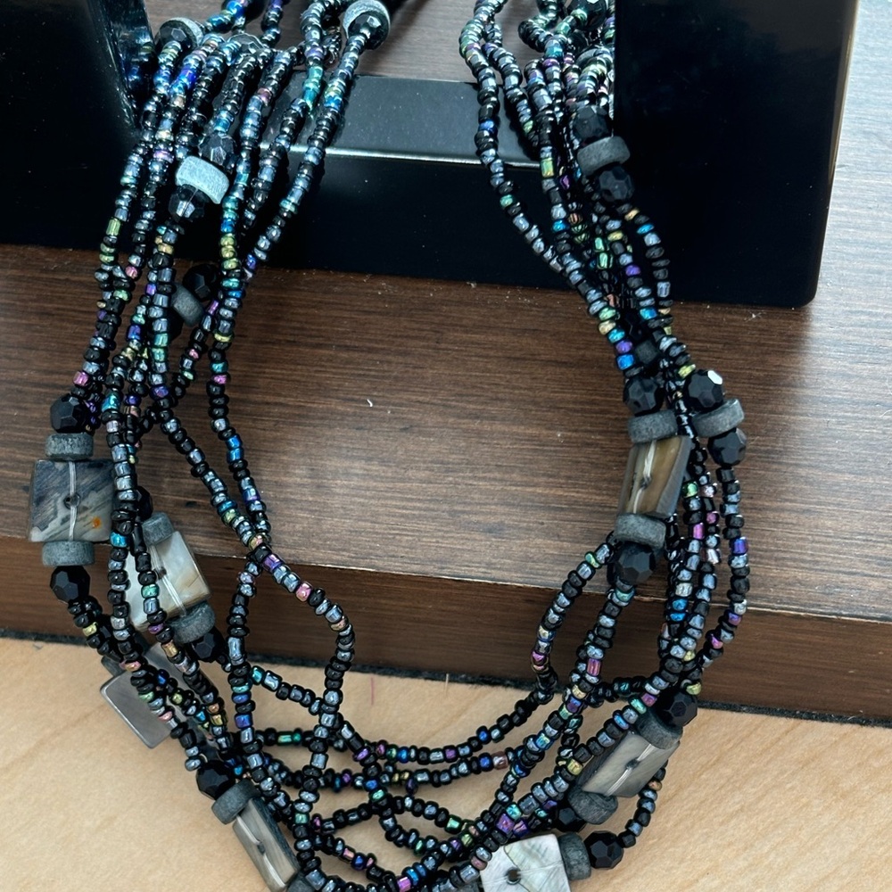 Blue seed beaded necklace / silver tone/ blue, black, purple, green colors